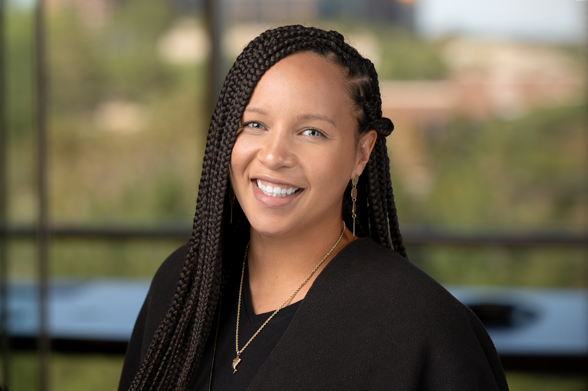 corporate headshots on blurred background